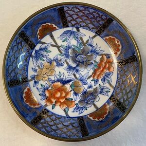 Vintage Brass encased Japanese Porcelain bowl.